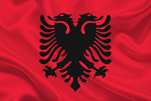 Roaming_0019_vecteezy_flag-of-the-country-of-albania-on-a-background-of-wavy-silk_3585746